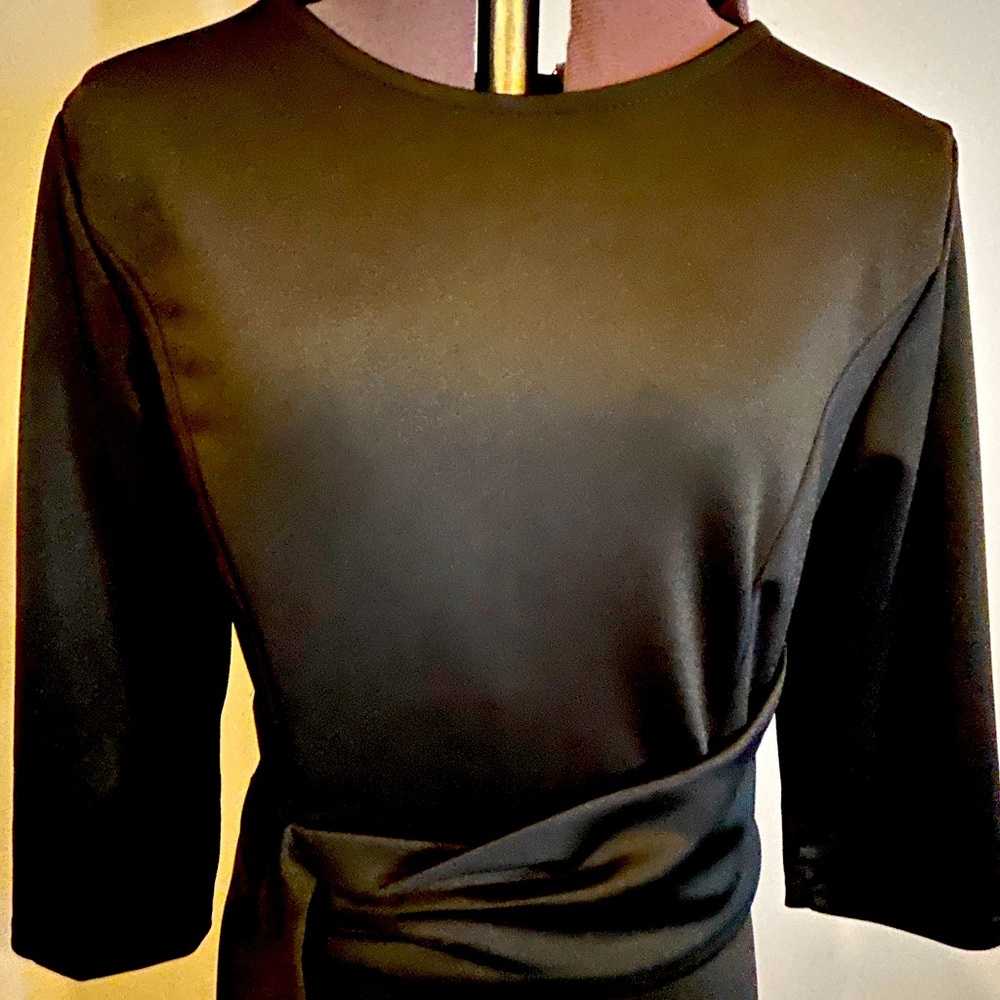 Black faux wrap dress. Never worn. NWT Perfect for holidays